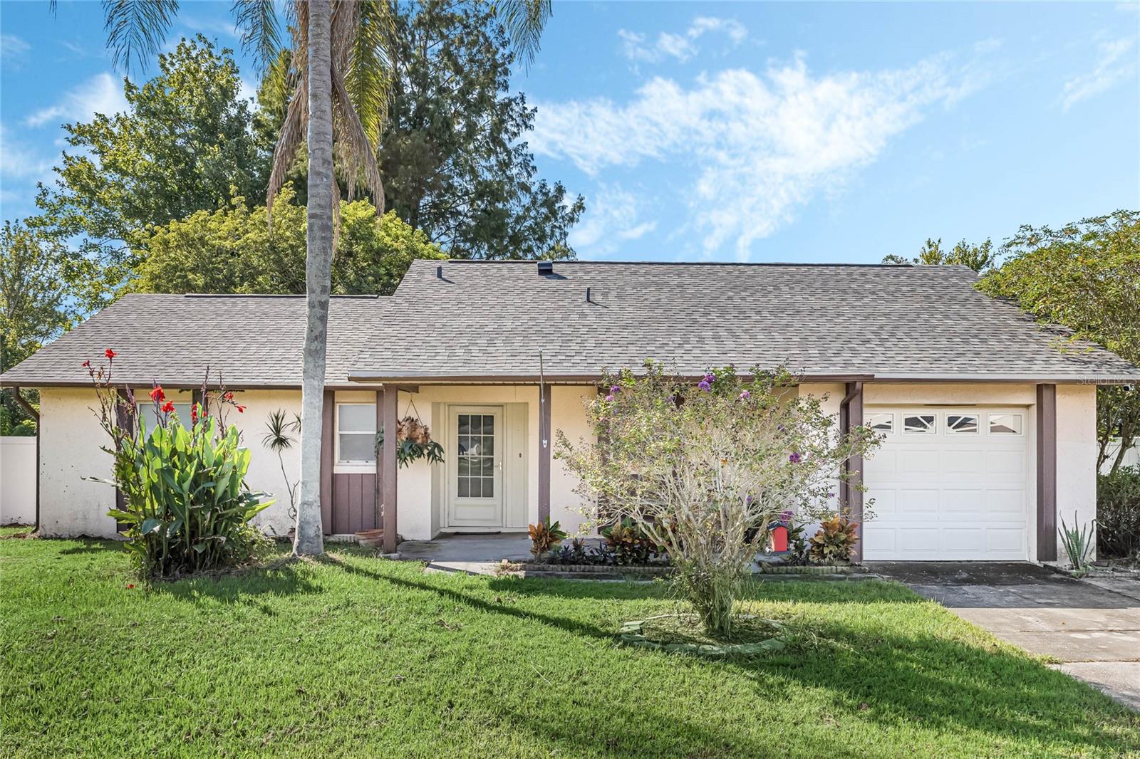 Step inside this charming 2 bedroom, 2 bathroom home in the sought after Conway area; beautifully updated and ready for its next chapter. With a new roof in 2022 and new AC in 2020, you can move in knowing the big-ticket items are already taken care of. The inviting floor plan begins with a welcoming foyer that flows into a bright, spacious living room with warm laminate flooring. The kitchen features granite countertops and plenty of prep space, making it perfect for both everyday living and entertaining. Just off the main living area, a flexible bonus room offers endless possibilities—think dining space, office, or cozy den. Both bathrooms have been stylishly renovated, adding a modern, refreshed feel throughout the home. Outside, enjoy your own private oasis, a fully fenced quarter-acre lot with room to garden, play, or simply relax. A storage shed keeps your tools tucked away, while the screened-in patio is ideal for morning coffee or evening gatherings. Tucked away in Ethans Glen, with no HOA this home offers a peaceful neighborhood setting with unbeatable convenience just minutes from Orlando International Airport, major roadways, and all the shopping, dining, and entertainment downtown Orlando has to offer. This home is the perfect blend of comfort, style, and location. Schedule your private tour today to come see this Conway cutie!