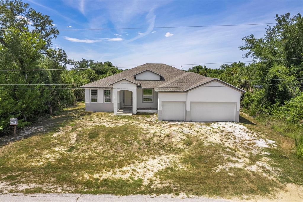 Photo of 13298 High Springs Avenue, Port Charlotte, FL 33981 (MLS # C7527231)
