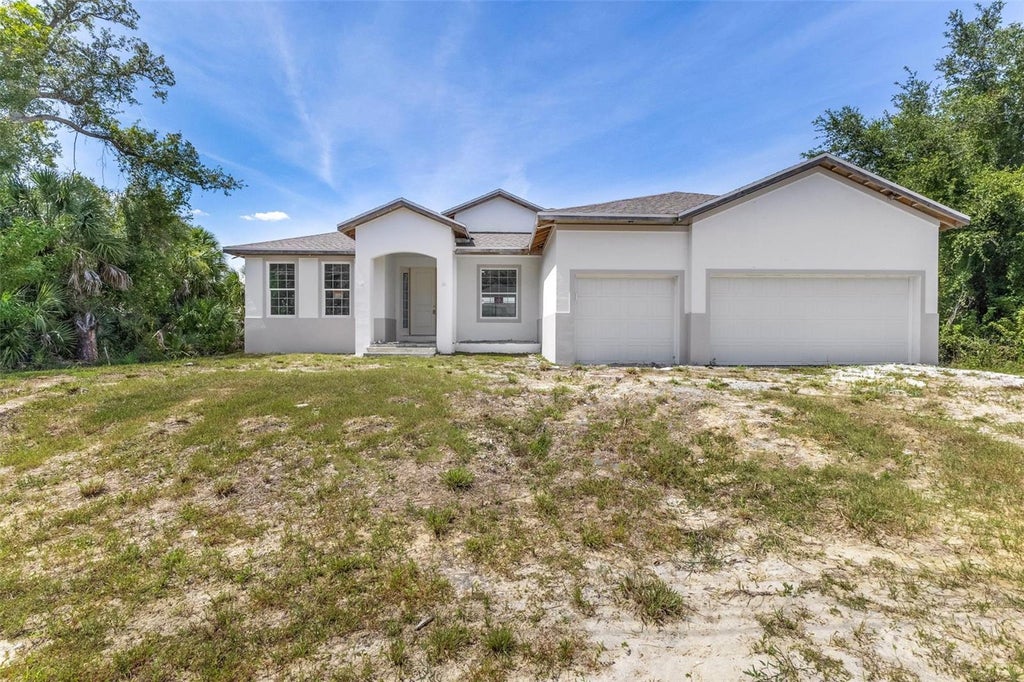 Photo of 13298 High Springs Avenue, Port Charlotte, FL 33981 (MLS # C7527231)