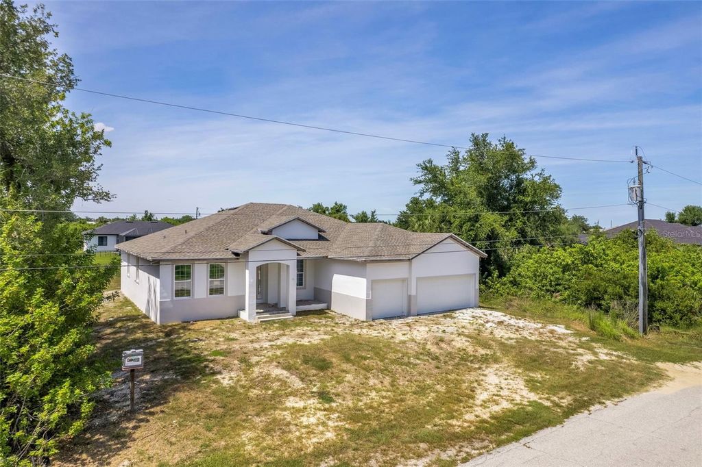 Photo of 13298 High Springs Avenue, Port Charlotte, FL 33981 (MLS # C7527231)