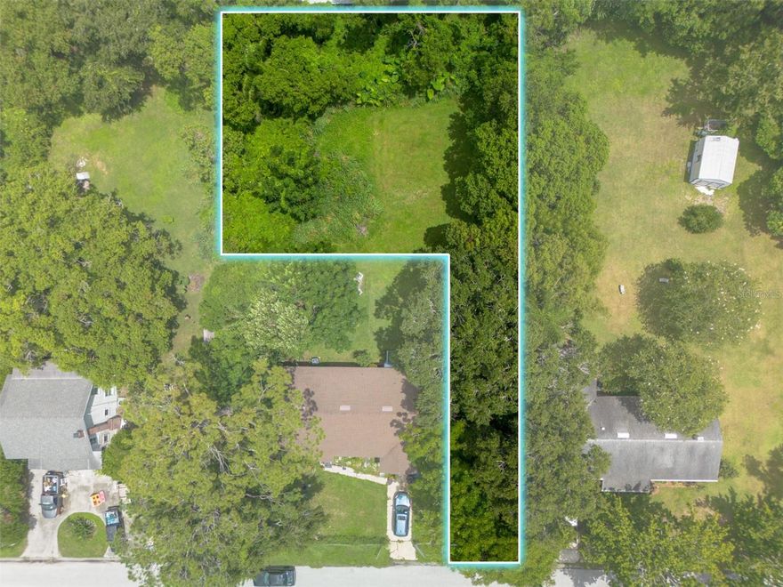Rare opportunity to own a flag lot in the highly sought-after 32806 zip code of Orlando! This vacant lot, located directly behind 2125 Carlton Dr, offers a unique development opportunity with the potential to build a duplex or two attached townhomes (buyer to verify with city/county zoning). In the attachment, you will find a preliminary plan previously considered for this build. Situated in a well-established neighborhood with close proximity to Downtown Orlando, Lake Conway, major highways, and top-rated schools, this lot provides excellent potential for a builder, investor, or homeowner looking to create a custom multi-family residence. Whether you're building to rent or sell, this lot presents significant upside in a high-demand area. Don’t miss out on one of the few remaining infill development opportunities in this prime location!