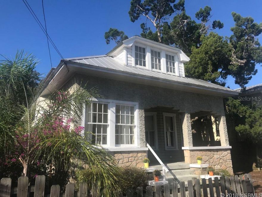 New Smyrna Beach Charmer.  This 1910 home has maintained all its character, original wood floor, wide base boards,  high ceiling, architectural columns, farm sink, just of few of the notable details.  This mixed use home would be of  perfect for a small family, make a great weekend beach home or use the downstairs for your business and live upstairs.  Just steps from historic Canal Street's shops and restaurants. Walk to the farmers market on Old Fort Park on Saturday mornings.  The city has approved off street parking. Home does require repairs and updates which have been considered in the price. Most furnishings negotiable Check it out today, its bound to win you over. ;Water: City