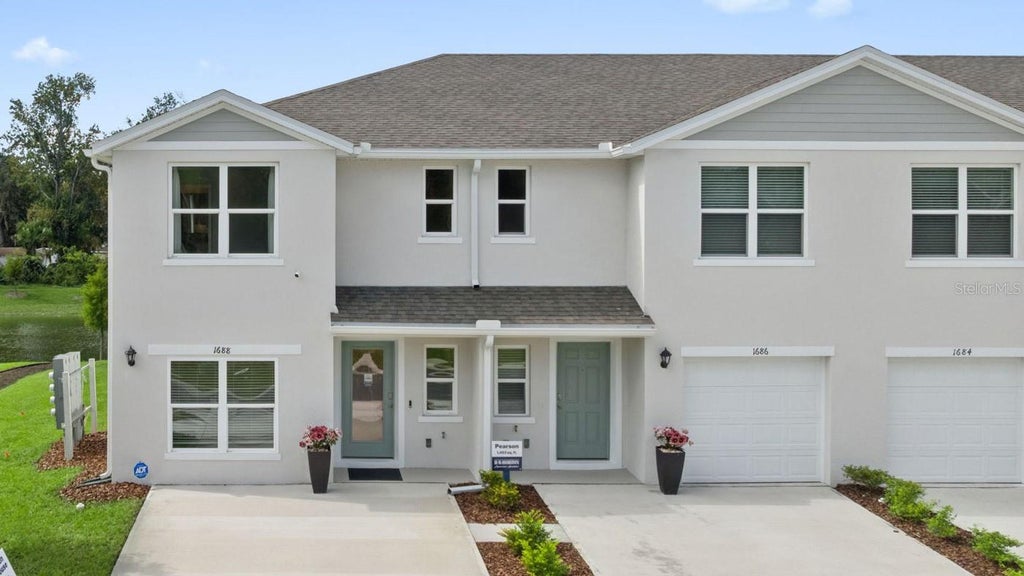 Photo of 1628 Great Osprey Way, New Smyrna Beach, FL 32168 (MLS # O6449603)