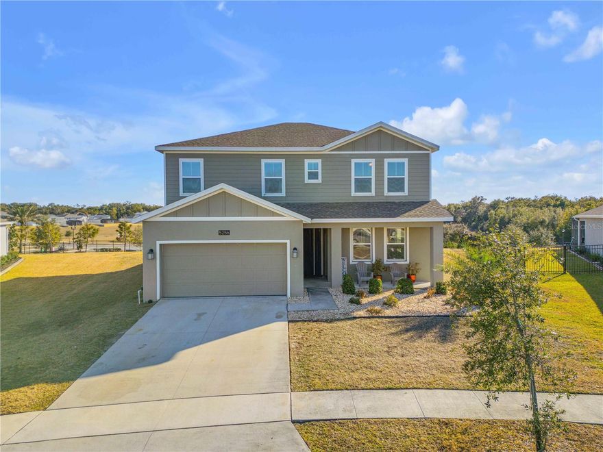 Designed with multigenerational living in mind, this 2022-built home in the 24-hour guard-gated Stoneybrook Hills community offers space, privacy, and flexibility in one of the area’s most convenient locations, just a short drive to Orlando attractions, major highways, shopping, and dining. The main level includes a true in-law suite with a private entrance, featuring a kitchenette with dishwasher, microwave, sink, and refrigerator, a dedicated laundry space for a stackable washer and dryer, and a full bathroom with a walk-in shower. Separate from the in-law suite, the main home’s open living and dining areas flow seamlessly into a spacious kitchen with gray shaker cabinetry, quartz countertops, a large island with counter height seating, a stylish backsplash, and pantry.  Upstairs, the primary suite offers a private retreat with a walk-in shower, garden tub, and an impressive 13x8 walk-in closet—truly the kind of space fashion lovers and organizers dream of along with three additional bedrooms, a flex room, and a full laundry room. This home features concrete block construction through the second story, a 3-car tandem garage, solar panels, natural light and 10-foot ceilings enhancing the open and airy feel.  Positioned high and dry, not in a flood zone and no flood history. Eligible for USDA, FHA, and VA financing. Stoneybrook Hills stands out for its unmatched resort-style amenities, including a clubhouse, playground, fitness center, pool, tennis and basketball courts, all within a secure, guard-gated setting. A rare opportunity for multigenerational living—schedule your showing now, this just hit the market and won’t be here for long!