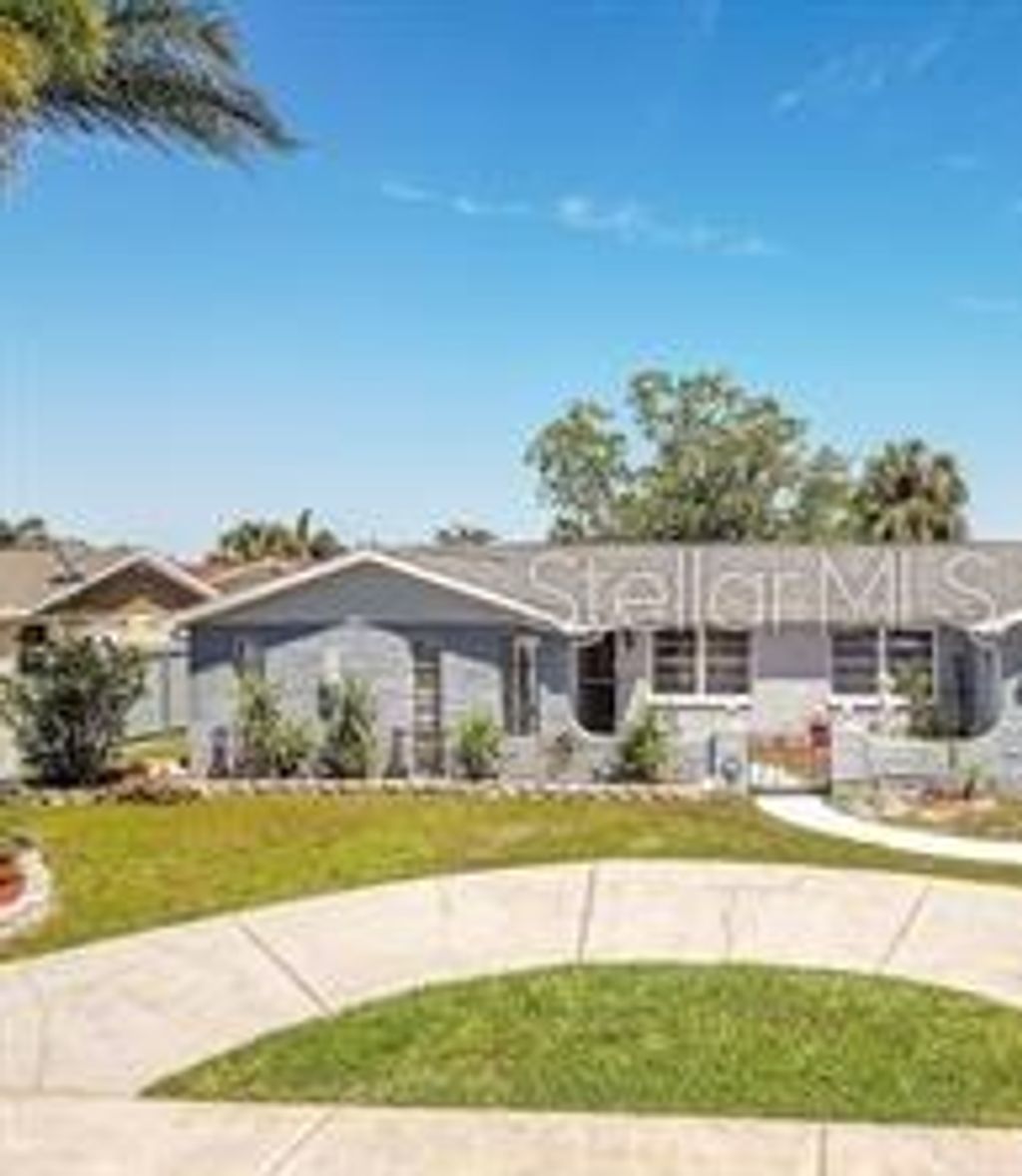 Photo of 6101 Seabreeze Drive, Port Richey, FL 34668 (MLS # TB8410235)