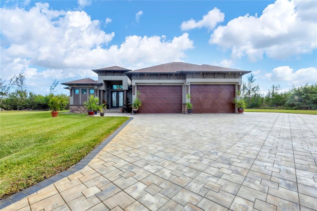 Photo of 10451 Hatchett Circle, Port Charlotte, FL 33981 (MLS # D6144718)