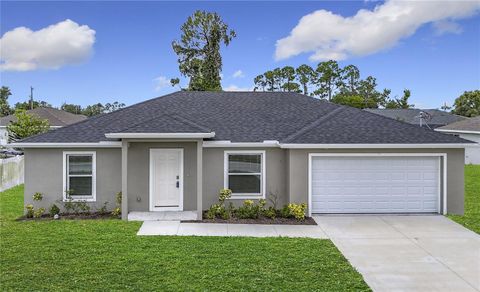 Photo of 1714 NE 40th Lane, Cape Coral, FL 33909 (MLS # OM709157)