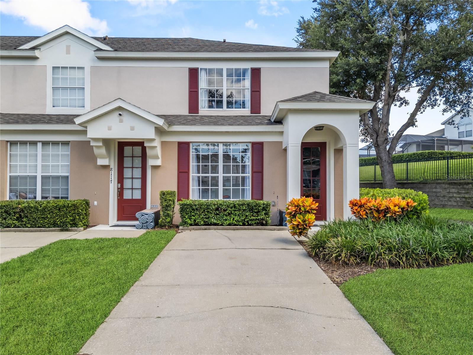 LOWEST PRICED TOWNHOUSE IN ALL OF WINDSOR PALMS!!! Welcome to 8115 Princess Palm Ln – a beautifully maintained 3-bedroom, 3-bath end unit townhome with private pool located in the highly desirable, guard gated resort community of Windsor Palms. Located less than 6 miles to Disney property, this fully functional home offers the perfect blend of comfort, privacy, and investment potential. Step inside to an open-concept layout featuring a spacious kitchen with upgraded stainless steel refrigerator, microwave and dishwasher that flows seamlessly into the living and dining areas—ideal for entertaining or relaxing after a day at the parks. The downstairs bedroom includes a large closet and full ensuite bathroom, perfect for guests or multigenerational living. Upstairs, you'll find two generously sized bedrooms, each with their own private ensuite baths and ample closet space. Enjoy your own private screened lanai with pavered patio and a sparkling plunge pool—your own serene retreat to unwind. This end-unit offers enhanced privacy and is just steps away from the resort-style amenities. Recent upgrades include a replaced roof (2020) and HVAC system (2019), giving you peace of mind and improved energy efficiency. Windsor Palms offers an unmatched resort lifestyle with amenities such as a clubhouse, resort pool with splash pad, fitness center, arcade, 58-seat movie theater, business center, tennis courts, basketball, volleyball, playground, and 24-hour gated security. Whether you're looking for a full-time residence, vacation home, or a turnkey rental property—this home checks all the boxes. Fully furnished option available! Don’t miss your chance to own in one of Kissimmee’s most sought-after resort communities!