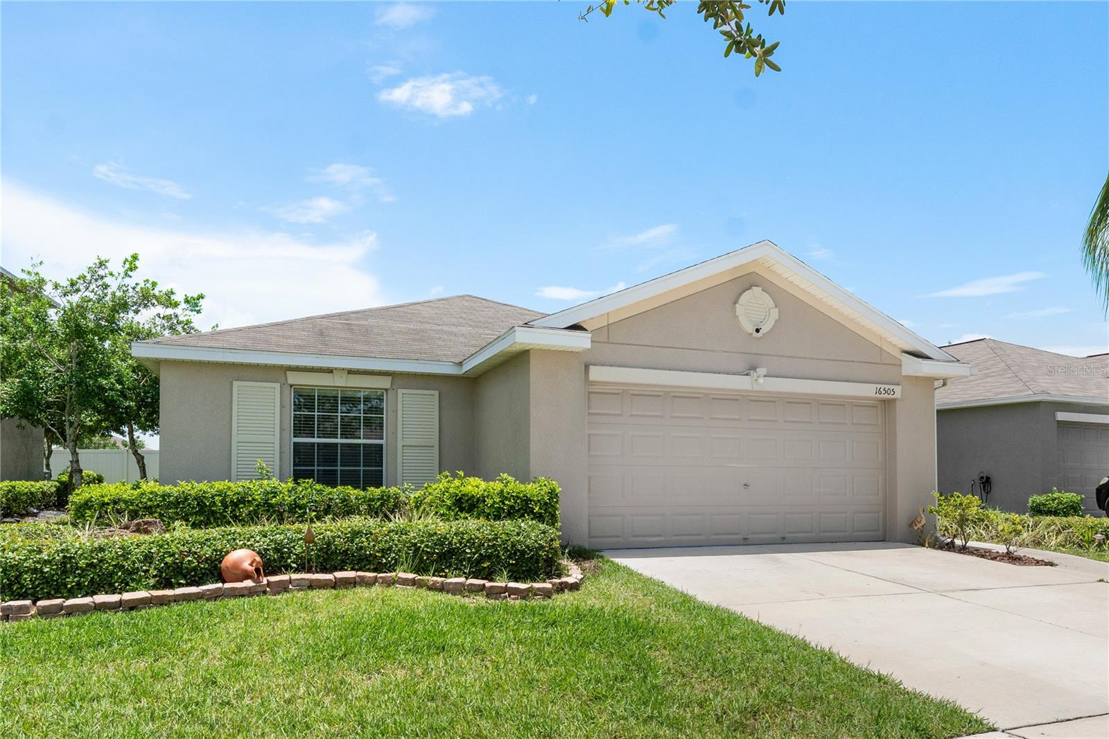 Beautiful 4-bedroom, 2-bath home located in the desirable Vista Palms community of Wimauma. Home offers a thoughtfully designed open floor plan with ceramic tile in the main living areas and carpeted bedrooms for comfort. The kitchen features stainless steel appliances, a large center island, and plenty of cabinet space, perfect for both daily living and entertaining. Additional bedrooms are generously sized and ideal for family, guests, or a home office. A covered patio overlooks the backyard, offering the perfect spot for relaxing or outdoor gatherings.