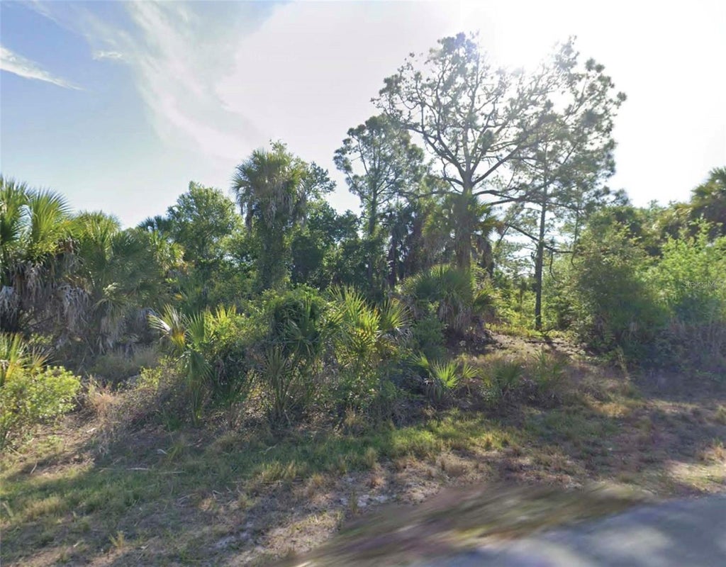 Photo of 379 Mcdill Drive, Port Charlotte, FL 33953 (MLS # O6453441)