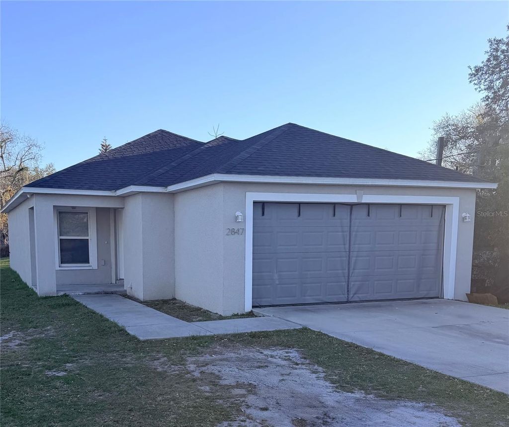 Photo of 2847 Maine Avenue, Lakeland, FL 33803 (MLS # TB8479086)