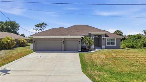 Photo of 119 Long Meadow Lane, Rotonda West, FL 33947 (MLS # O6400126)