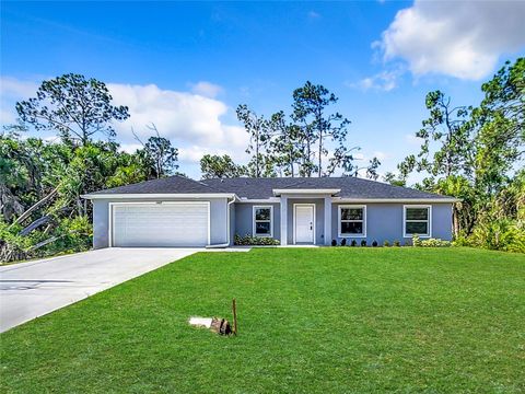 Photo of 14409 Chamberlain Boulevard, Port Charlotte, FL 33953 (MLS # OM709066)