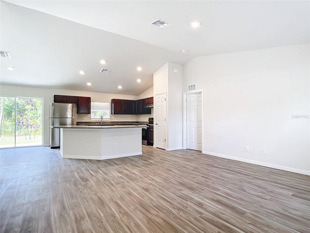 Photo of 14409 Chamberlain Boulevard, Port Charlotte, FL 33953 (MLS # OM709066)