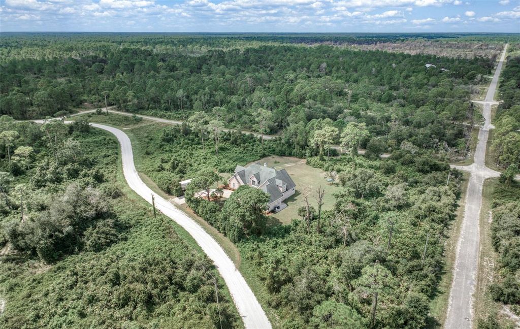 Photo of 3357 Popinjay Avenue, Lake Placid, FL 33852 (MLS # TB8454492)