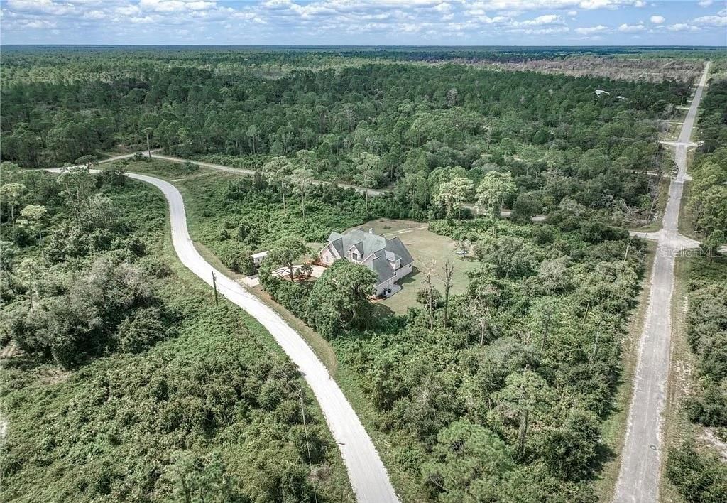 Photo of 3357 Popinjay Avenue, Lake Placid, FL 33852 (MLS # TB8454492)