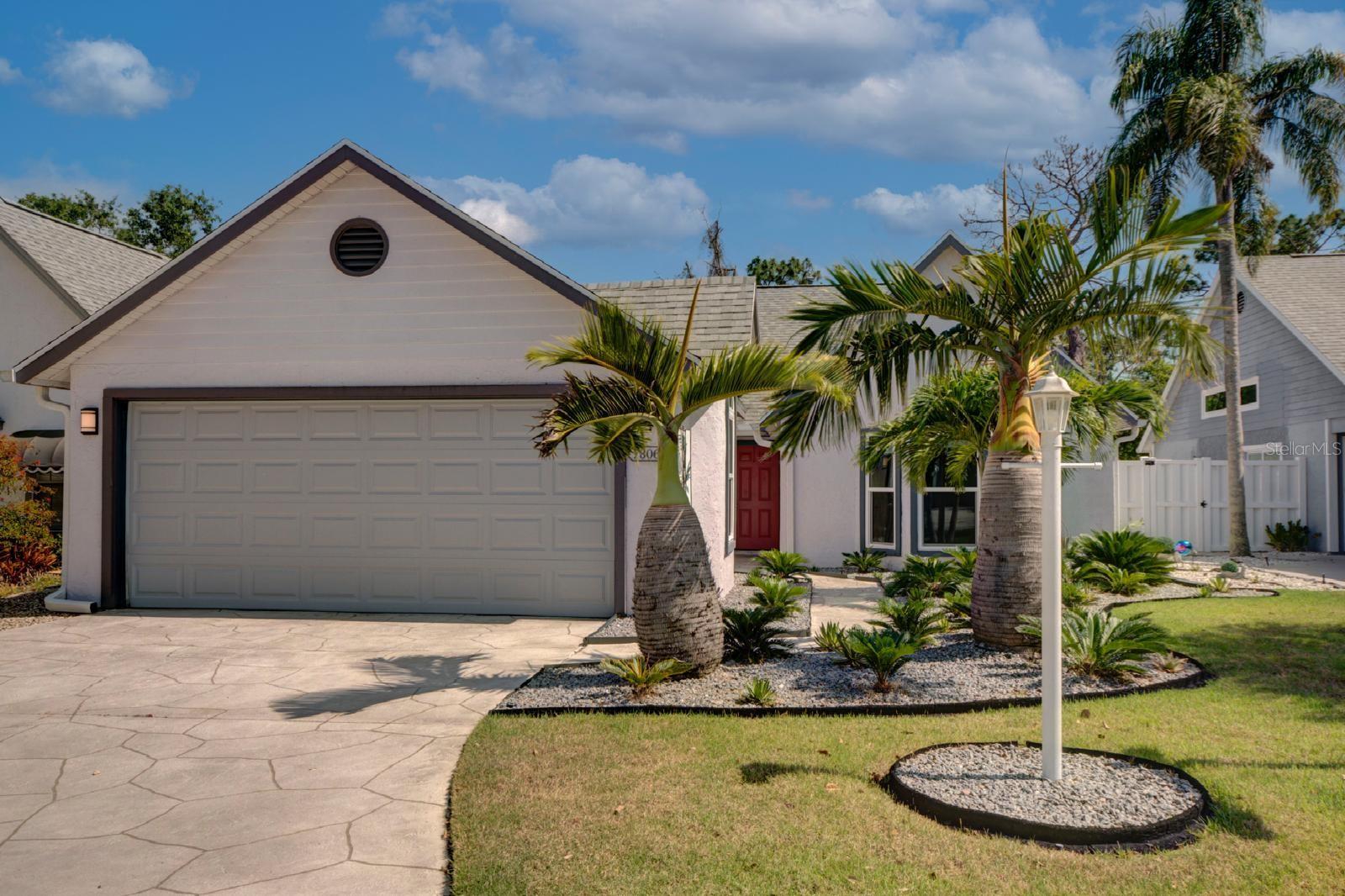 **Beautifully Updated 2 Bedroom + Den Home in Sarasota's Treetops Community**
This move-in-ready 2-bedroom, 2-bathroom home with a spacious den is located in the established Treetops community in Sarasota, Manatee County. Ideally located near UTC, I-75, downtown Sarasota, and the Gulf Coast beaches, this property offers both accessibility and comfort.
The home includes **impact-resistant windows, doors, and garage door**, providing added durability and peace of mind. The exterior features **a uniquely patterned driveway**, mature landscaping, and **a fully fenced backyard** with low-maintenance stone accents and a **screened lanai**, creating a peaceful outdoor retreat.
Inside, you'll find **tile flooring throughout**, **an open layout** with vaulted ceilings, and a remodeled kitchen equipped with **granite countertops, solid wood cabinetry, and stainless steel appliances**. The den provides flexible use as an office, hobby space, or guest area.
The bathrooms have been tastefully upgraded with **vessel sinks**, **custom tilework**, and **glass-enclosed showers**. Both bedrooms include built-in closet systems, ceiling fans, and plenty of natural light.
Additional highlights include a **renovated garage with extra shelving**, **interior laundry with Samsung appliances**, and a layout ideal for relaxing or entertaining.
The Treetops community features a **community pool, tennis court**, and beautiful green spaces — all with **low HOA fees and no CDD**. Internet and cable are included with the association.
Don't miss the chance to explore this well-maintained home—schedule your private showing today!