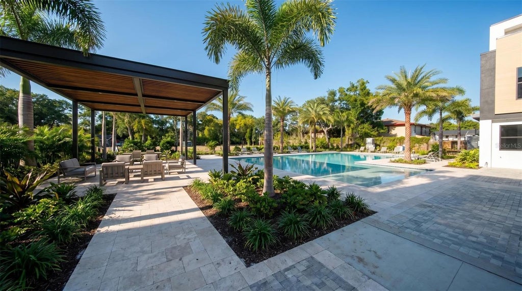 Photo of 8405 Modano Place, Tampa, FL 33614 (MLS # TB8553919)