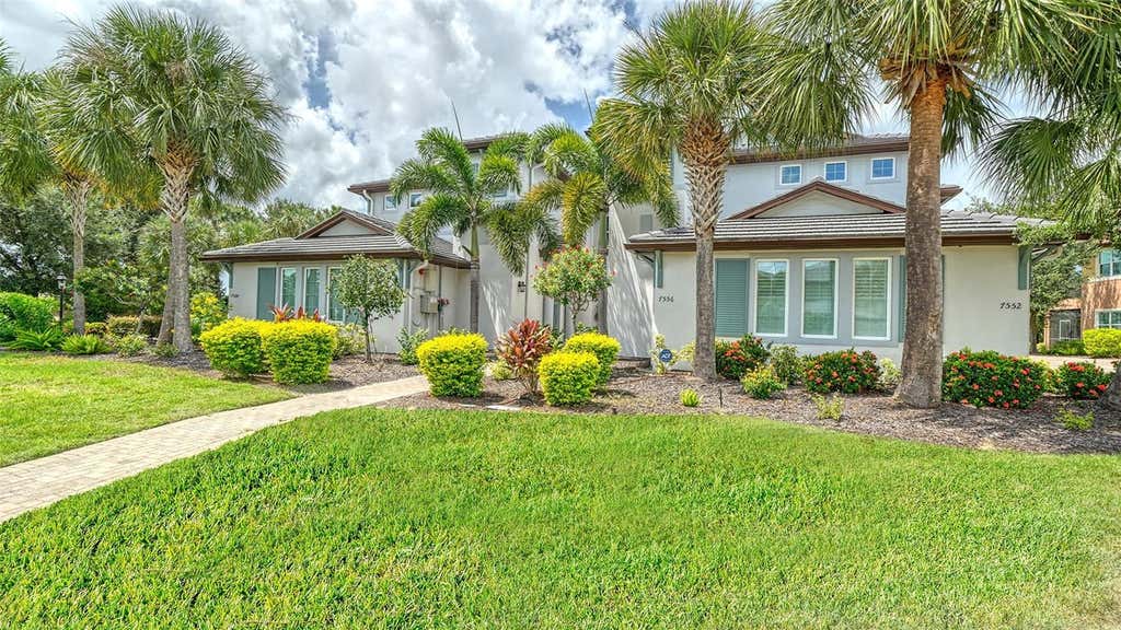 Photo of 7552 Divot Loop, Bradenton, FL 34202 (MLS # A4703230)