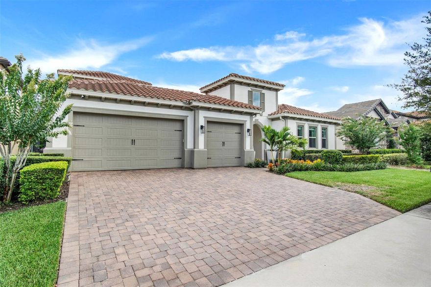 Step into a world of elegance and sustainability as you discover this captivating SOLAR POWERED - POOL home, where comfort meets LUXURY in perfect harmony, the SOLAR PANELS OFFSETS 100% of the electric bill. Nestled within the gorgeous GATED and WATERFRONT community of Waterside in Winter Garden, this residence shines as a true gem. From the very first step, you'll be captivated by the seamless fusion of beauty and functionality. With almost $200,000 in thoughtful UPGRADES, every corner of this home exudes sophistication. The heart of this abode is the Chef's kitchen, boasting a gas stove and TOP-OF-THE-LINE stainless steel appliances, inviting you to indulge in culinary creations and warm gatherings. The bonus room and home management center add a practical touch to daily living, while built-ins, crown molding, and meticulous attention to detail elevate the overall aesthetic. Step outside to discover a PRIVATE COURTYARD at the main entrance, also featuring an enchanting backyard OASIS. Here, a SALTWATER jetted POOL with a sundeck and a RETRACTABLE screened-in covered lanai create the perfect space for hosting unforgettable moments with loved ones. The connection between indoor and outdoor living spaces is further enhanced, promising delightful relaxation and entertainment. With 5 bedrooms and an additional bonus room upstairs, currently being used as a theater, this home offers abundant space for all your needs. Fully wired for surround sound both inside and out, this home ensures an immersive audio experience. Recently installed garage built-ins enhance storage convenience, while the custom master closet, renovated master bedroom, upgraded guest bathrooms, and LUXURIOUS flooring throughout showcase the commitment to refined living. As part of Waterside's exclusive community, you'll enjoy access to a wealth of amenities, including a resort-style swimming pool, a clubhouse boasting a state-of-the-art fitness center, serene lakes and ponds, inviting picnic areas, meandering walking trails, and a playground - truly a daily vacation experience. Beyond the gates, the convenience of city life awaits, with easy commuting to Orlando and mere minutes away from downtown Winter Garden, Hamlin, and Winter Garden Village, where an array of shopping, dining, and entertainment options await your exploration. Adding to its allure, this home is zoned for A+ K-12 schools, ensuring a top-tier education for your family. Don't miss this opportunity to experience the allure of this remarkable home. Schedule an appointment today and immerse yourself in its splendor. Be sure to explore the captivating video tour, offering a glimpse of the beauty that lies within. Welcome to the epitome of refined living in Waterside, Winter Garden. ZONED for the NEW Hamlin Elementary and Middle School.