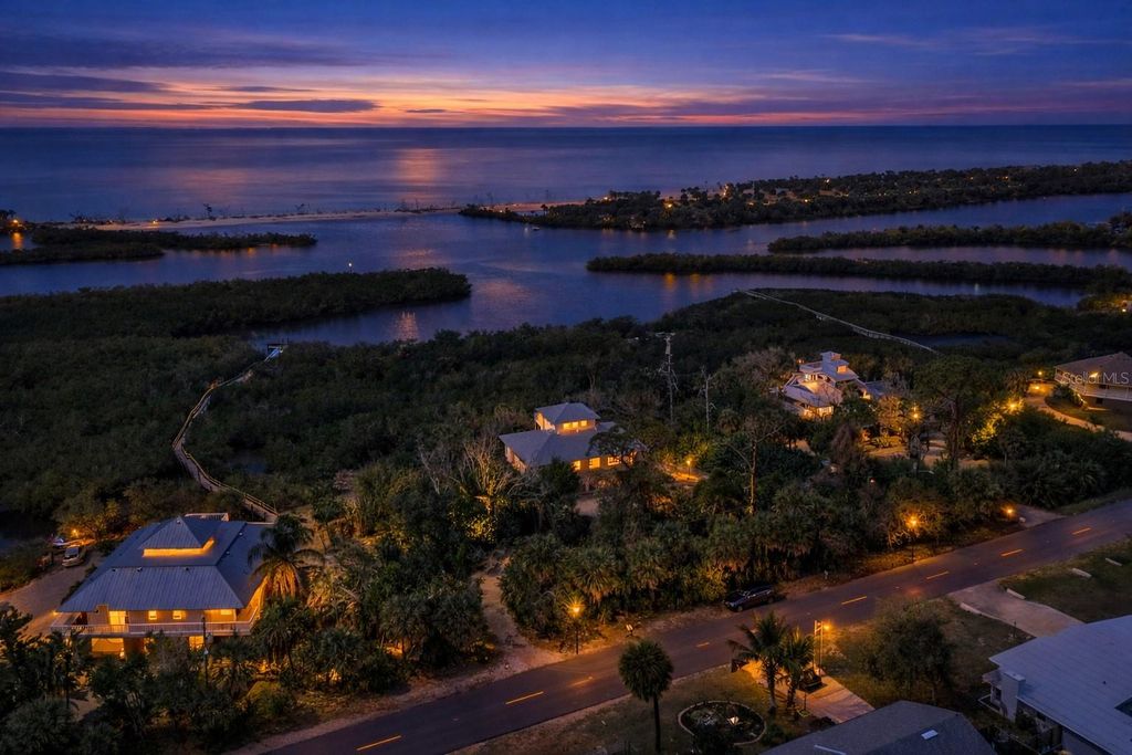 Photo of 5000 Lemon Bay Drive, Venice, FL 34293 (MLS # A4685103)