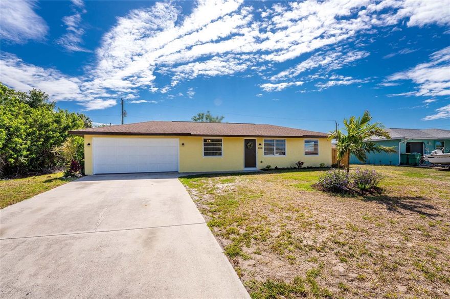 Englewood living with no HOA and just 6 miles to the Gulf beaches, where easy days, outdoor space, and a flexible layout come together! Located in the heart of Englewood, this two bedroom, two bathroom home offers a comfortable split bedroom floorplan in an X flood zone, giving you peace of mind while enjoying a location that keeps everything within reach. Inside, you will find brand new LVP flooring throughout, creating a clean, cohesive feel, while sliding glass doors from the dining area open to a spacious Florida Room that extends your living space and fills the home with natural light, making it the perfect spot to unwind, entertain, or set up a casual workspace. The galley style kitchen is designed for everyday living with plenty of cabinetry, granite-look Formica countertops, and a stone design backsplash. The ensuite primary bedroom features a walk-in closet, and the recently upgraded vanity along with a fully tiled tub and shower combination add style to the space. The guest bedroom is generously sized, and the guest bathroom offers dual access from both the bedroom and kitchen area for added convenience. Major improvements include a tankless hot water heater, along with new light fixtures that bring a modern touch throughout. Step outside to a patio area and partially fenced yard, offering room to add a pool, garden, or let pets enjoy the space, along with a storage shed that is perfect for beach gear and golf clubs. The two car garage features epoxy coated flooring and built-in cabinetry, giving you space for both parking and a functional workspace. With no HOA, you have the freedom to truly make the property your own. Centrally located near local dining, shopping, medical facilities, nature parks, and nearby boat and kayak launches, this location makes it easy to enjoy everything Englewood has to offer, all from 7378 Mamouth Street.