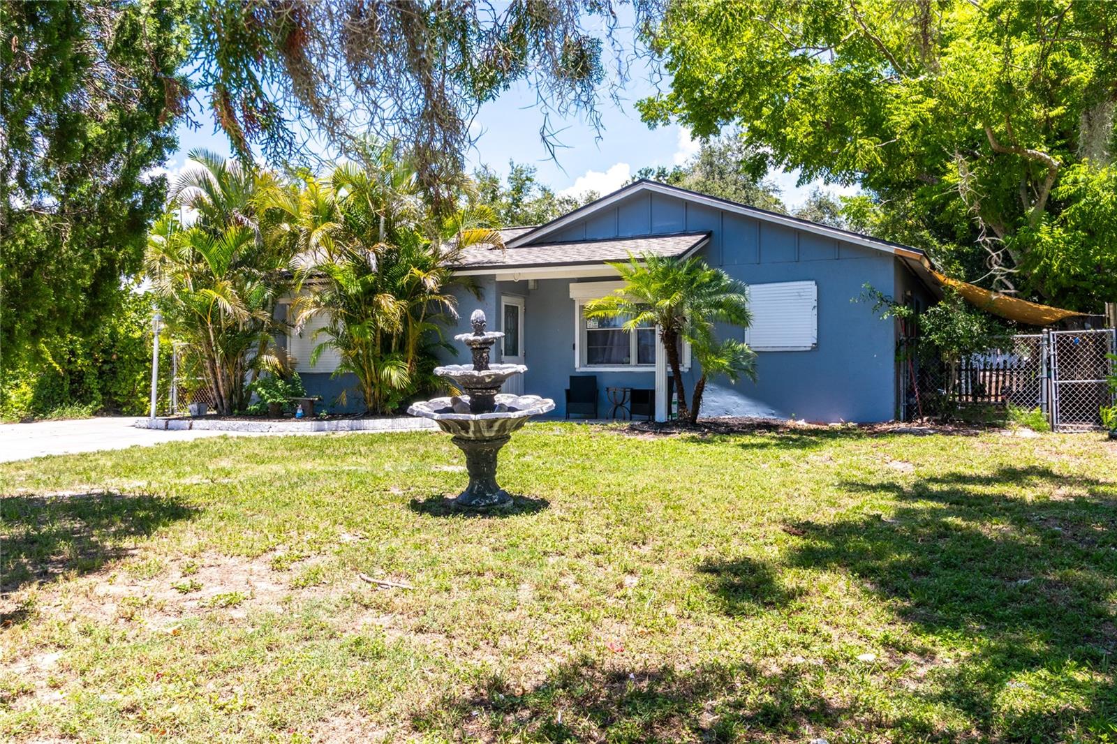 Nestled at the end of a quiet dead-end street just five minutes from downtown Sarasota, this freshly updated 3-bedroom pool home offers the perfect blend of comfort, privacy, and convenience. Set on over a quarter-acre lot, the massive fenced-in backyard is a true retreat—featuring a huge in-ground pool, plenty of room to play or entertain, and dedicated parking for your RV, boat, or extra vehicles. The open floor plan connects the living, dining, and kitchen spaces, creating a light-filled layout ideal for gatherings and everyday living. Luxury vinyl plank flooring has just been installed in the bedrooms, and a brand-new roof was completed in July 2025 for added peace of mind. The backyard also includes two versatile bonus structures—an air conditioned she-shed and an open air man cave—that offer creative space, extra storage, or the perfect home office. Located in an Opportunity Zone, this home presents an exceptional investment opportunity. Enjoy the nearby amenities of Payne Park, top-rated dining, and world-class beaches like Siesta Key, just 15 minutes away. Whether you're looking for a forever home, a seasonal escape, or a smart rental property, 942 Tarpon Avenue delivers space, flexibility, and location with no HOA and no rental restrictions.