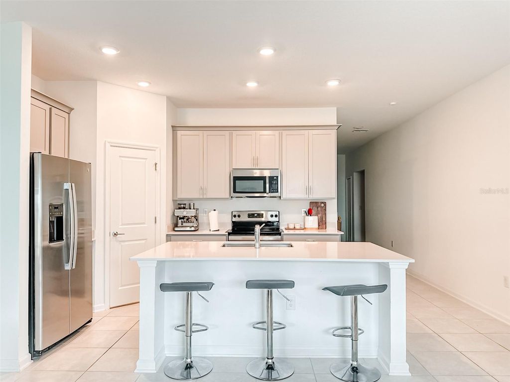 Photo of 1828 Perch Hammock Loop, Groveland, FL 34736 (MLS # O6390678)