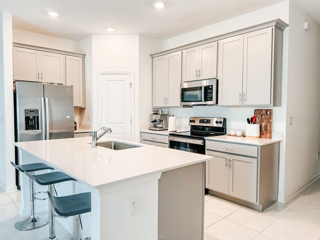 Photo of 1828 Perch Hammock Loop, Groveland, FL 34736 (MLS # O6390678)