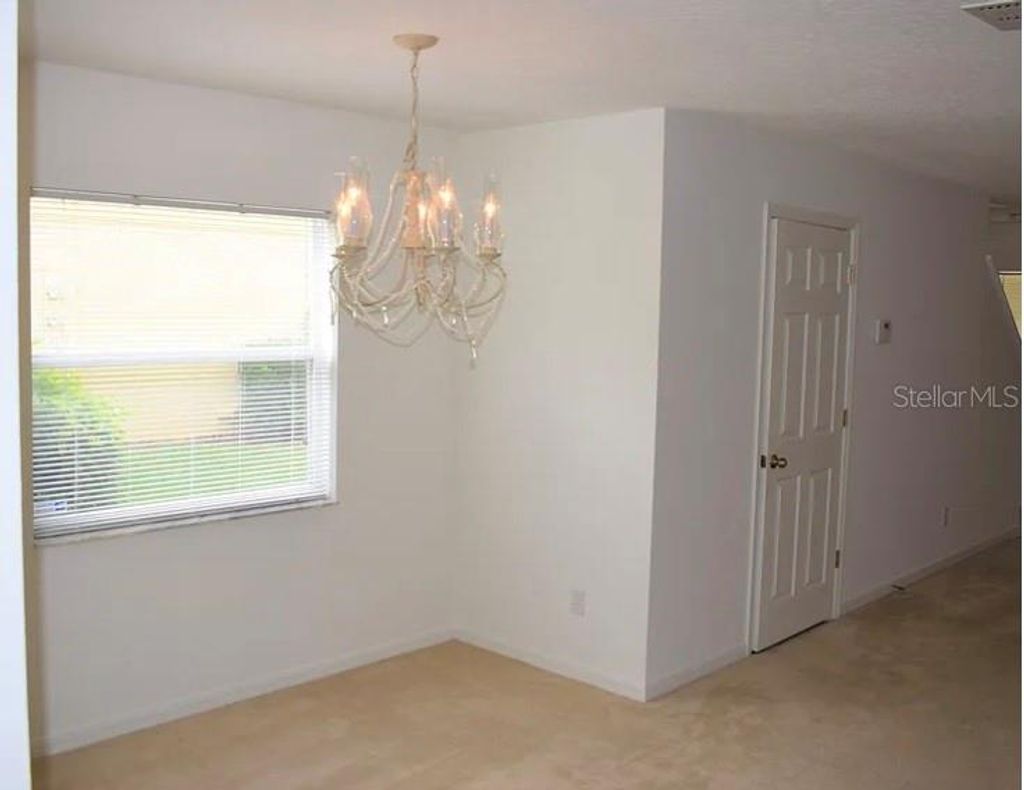 Photo of 521 Cresting Oak Circle #76, Orlando, FL 32824 (MLS # O6385288)