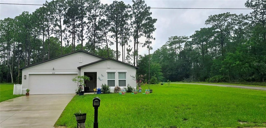 Photo of 6694 N Edelweiss Way, Citrus Springs, FL 34434 (MLS # S5155008)