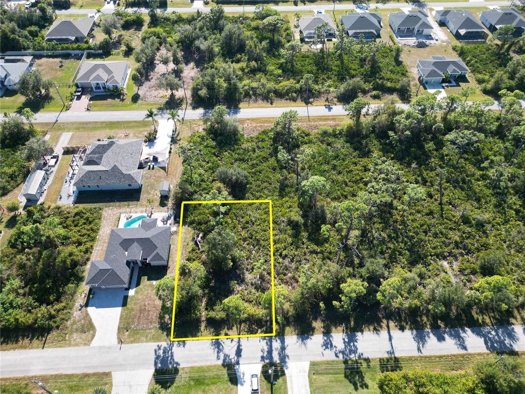 Photo of 13417 Yager Lane, Port Charlotte, FL 33981 (MLS # D6144900)