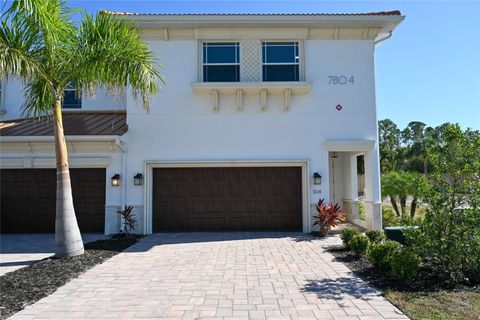 Photo of 7804 Hidden Creek Loop #104, Lakewood Ranch, FL 34202 (MLS # TB8429100)