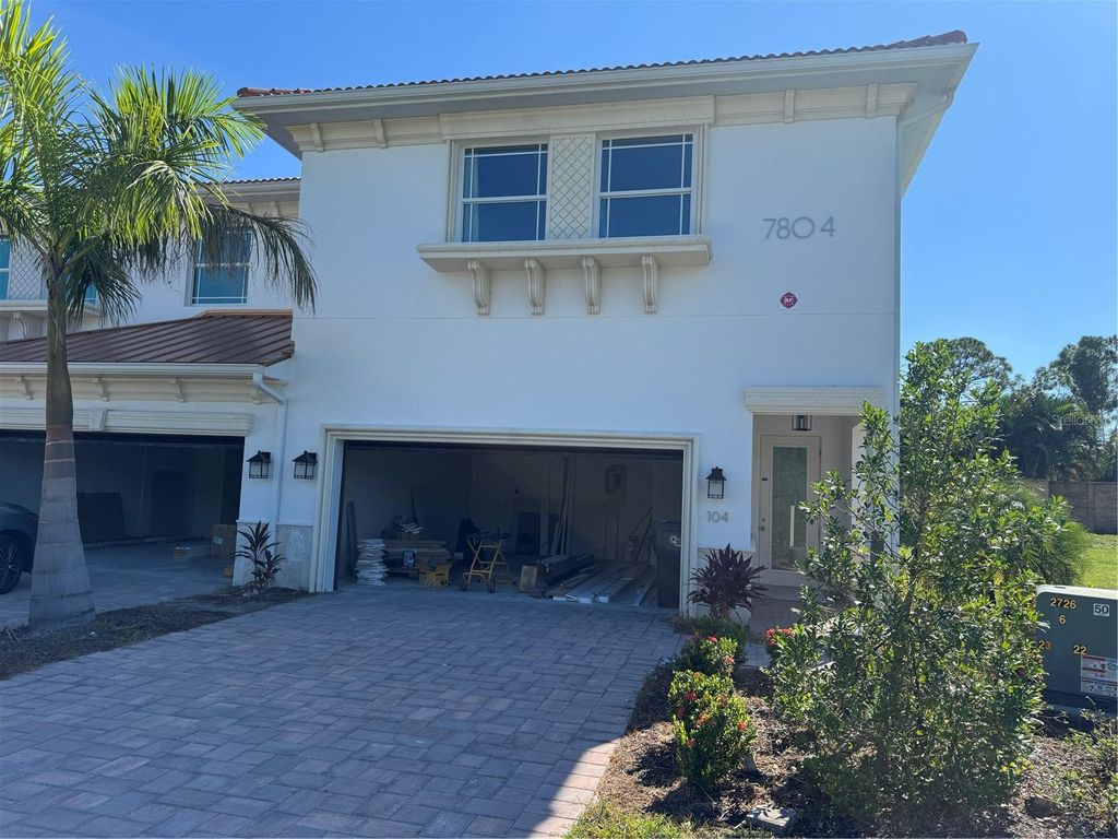 Photo of 7804 Hidden Creek Loop #104, Lakewood Ranch, FL 34202 (MLS # TB8429100)