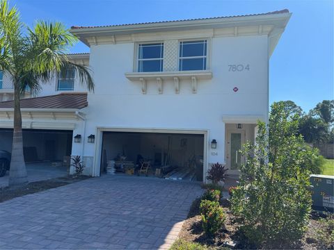 Photo of 7804 Hidden Creek Loop #104, Lakewood Ranch, FL 34202 (MLS # TB8429100)