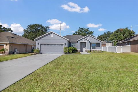 Photo of 33943 Emerald Pond Loop, Leesburg, FL 34788 (MLS # O6348197)