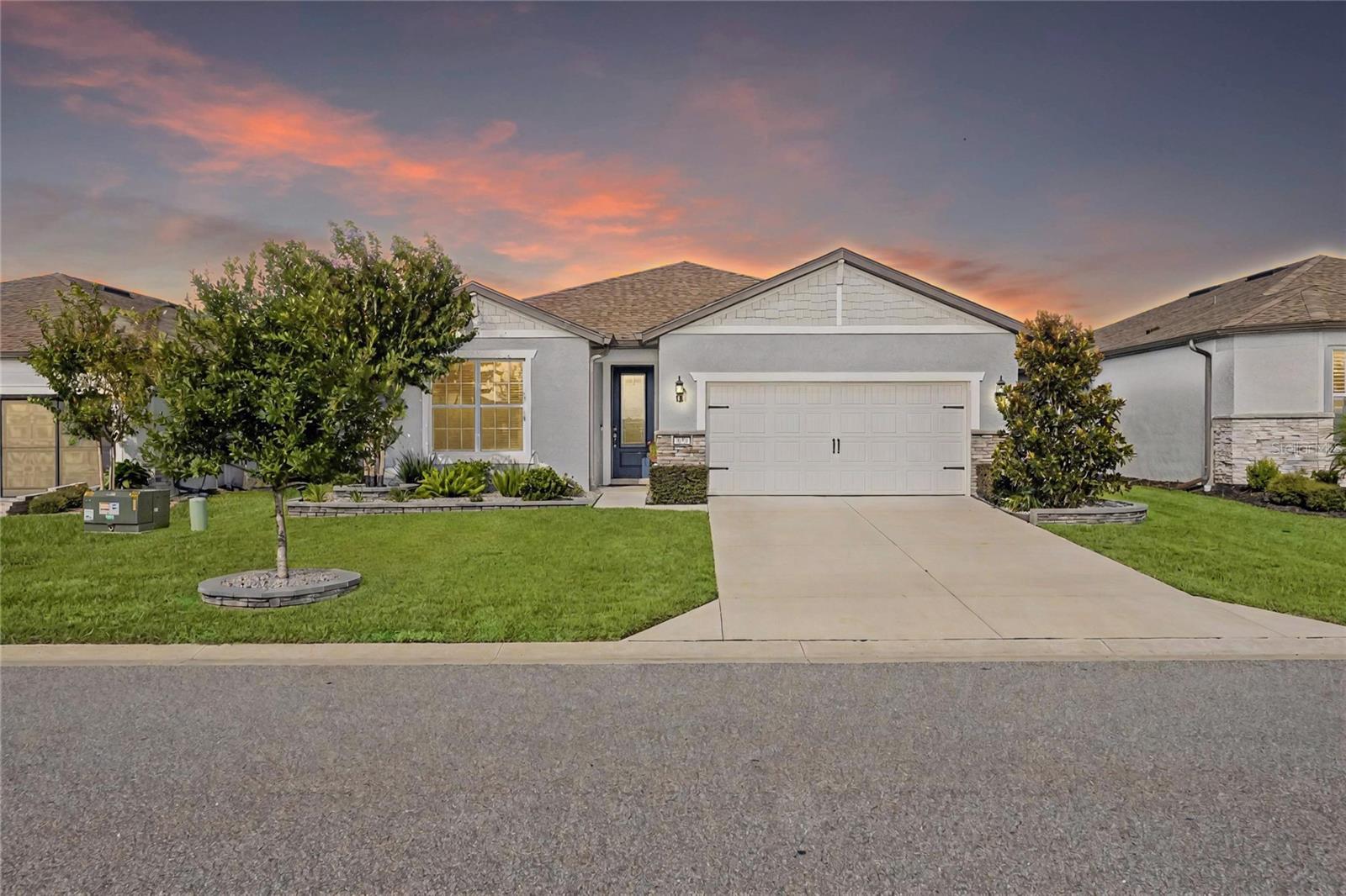 Welcome to this beautifully maintained Cedar model in the desirable 55+ community of Del Webb Stone Creek. This 3-bedroom, 2-bath home backs up to a tranquil meadow, offering both privacy and peaceful views. Inside, you’ll find LVP flooring throughout the main living areas, tile in the bathrooms, and cozy carpet in the two guest bedrooms. Thoughtful upgrades include crown molding on the kitchen cabinets and a custom closet organizer in the primary suite, while the primary bath features a spacious walk-in tile shower with a bench for added comfort.
Outdoor living is easy with a screened lanai and paver back patio, perfect for relaxing or entertaining. Additional highlights include an epoxied garage floor, extra storage, and a smart, functional design that makes everyday living simple and organized. This move-in ready home offers the perfect blend of comfort and convenience in one of Ocala’s premier active adult communities.