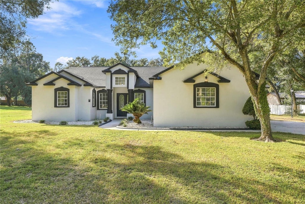 Photo of 12114 Hazen Avenue, Thonotosassa, FL 33592 (MLS # TB8563244)