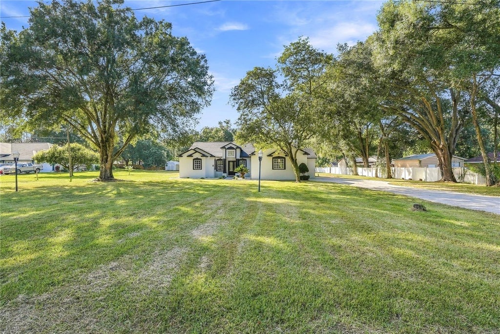 Photo of 12114 Hazen Avenue, Thonotosassa, FL 33592 (MLS # TB8563244)