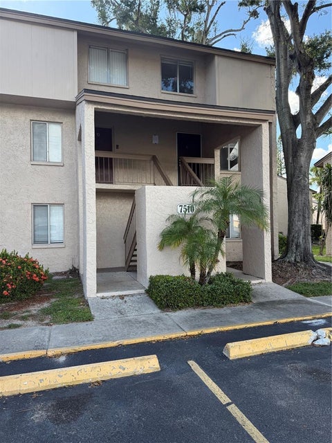 Photo of 7510 Needle Leaf Place #57, Tampa, FL 33617 (MLS # TB8555110)