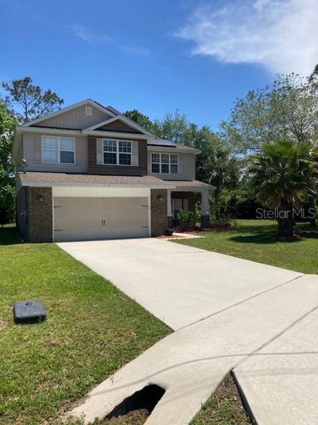 Photo of 7 Roxanne Place, Palm Coast, FL 32164 (MLS # FC316994)