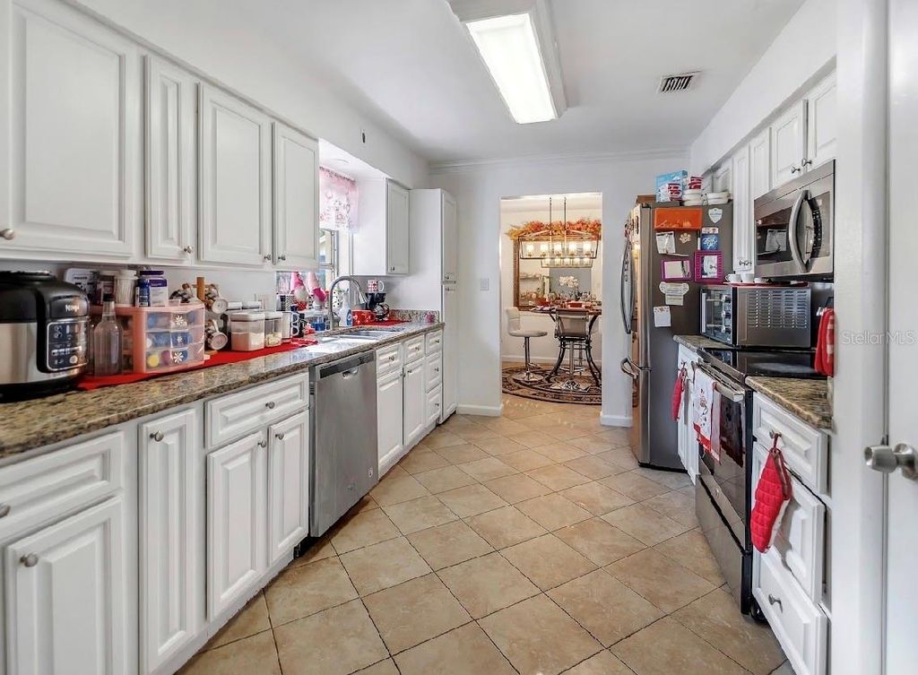 Photo of 5516 Sedgefield Street, Orlando, FL 32808 (MLS # S5147387)