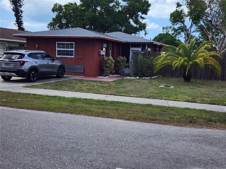 Diamond in the rough. This 3 bedroom and 3 bathroom home boasts over 1600sf and a pool. Perfect for a family or rental income. Each bedroom has its own en-suite bathroom. The kitchen and bathrooms have been updated. No HOA. The roof is 3 years old, pool surface recently refinished, pool pump replaced and tankless water heater. There is a large Florida room at the back of the home that leads out to a private pool and large yard that is completely fenced in for your privacy and perfect for entertaining. Beautiful sunsets as your barbecuing for all your guests on the large deck. Centrally located to all Sarasota attractions. Come put your finishing touches on this home and make it your own.