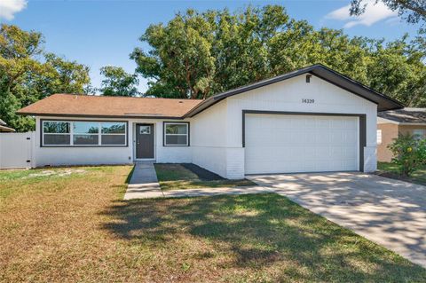 Photo of 14339 Diplomat Drive, Tampa, FL 33613 (MLS # TB8445224)
