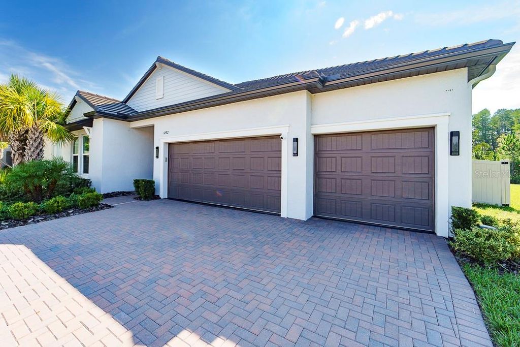 Photo of 10982 Banyan Breeze Boulevard, Land O Lakes, FL 34638 (MLS # TB8422785)