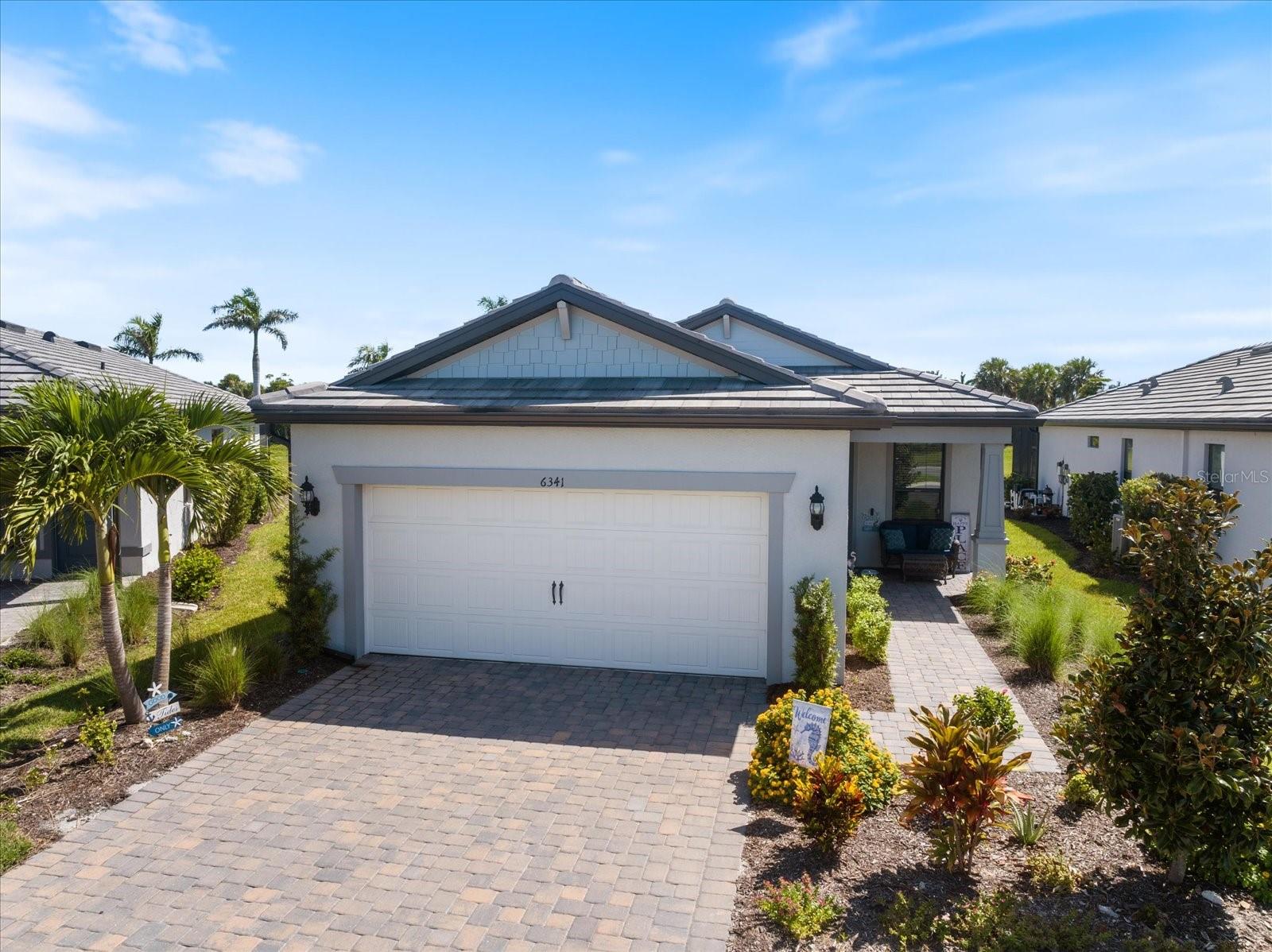 This Contour model is situated on a private cul-de-sac lot backing to a large greenspace, offering both privacy and open views. The home features an extended lanai and paver patio designed for outdoor living and entertaining, along with a fenced backyard and a four-foot garage extension for added storage or a golf cart. Inside, you’ll find all tile floors, upgraded appliances, eight-foot interior doors, squared sinks, and blinds throughout, creating a move-in-ready home with modern style and convenience.
Talon Preserve is a resort-style community where residents enjoy a heated beach-entry pool with rock waterfall, spa, lap lanes, a full-service restaurant and bar, tennis courts, eight pickleball courts, bocce, a fitness center, clubhouse, playground, and direct access to the Legacy Trail. All lawn maintenance is included, allowing you more time to enjoy everything this active community has to offer.
Conveniently located near beaches, dining, shopping, and medical centers, and just a short drive to Nokomis Beach, downtown Venice, and Siesta Key, this home combines comfort, convenience, and lifestyle. No matter where you are in life’s journey—downsizing, retiring, or just starting out—this home is the key to enjoying Florida living at its best.