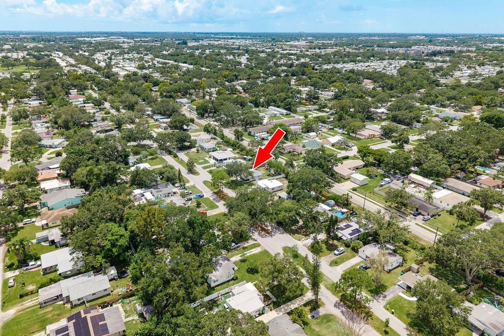 Photo of 130 Melody Lane, Largo, FL 33771 (MLS # TB8418158)