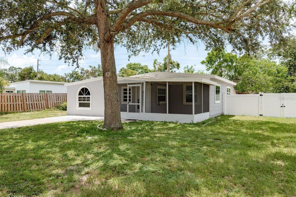 Photo of 130 Melody Lane, Largo, FL 33771 (MLS # TB8418158)