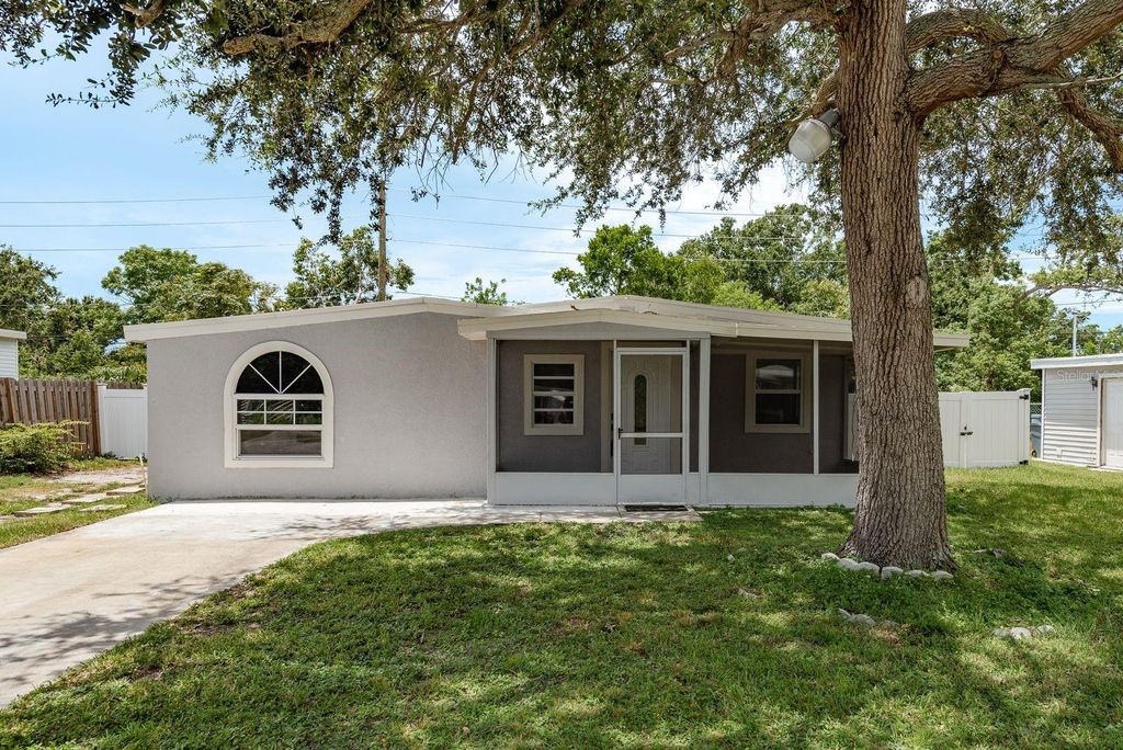 Photo of 130 Melody Lane, Largo, FL 33771 (MLS # TB8418158)