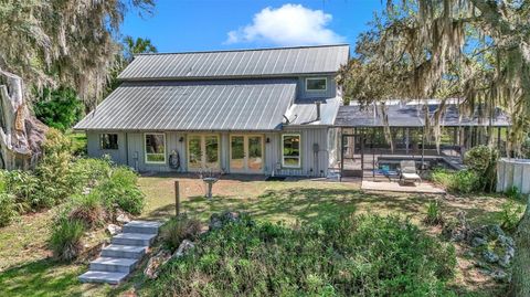 Photo of 12490 NW Highway 320, Micanopy, FL 32667 (MLS # OM697647)